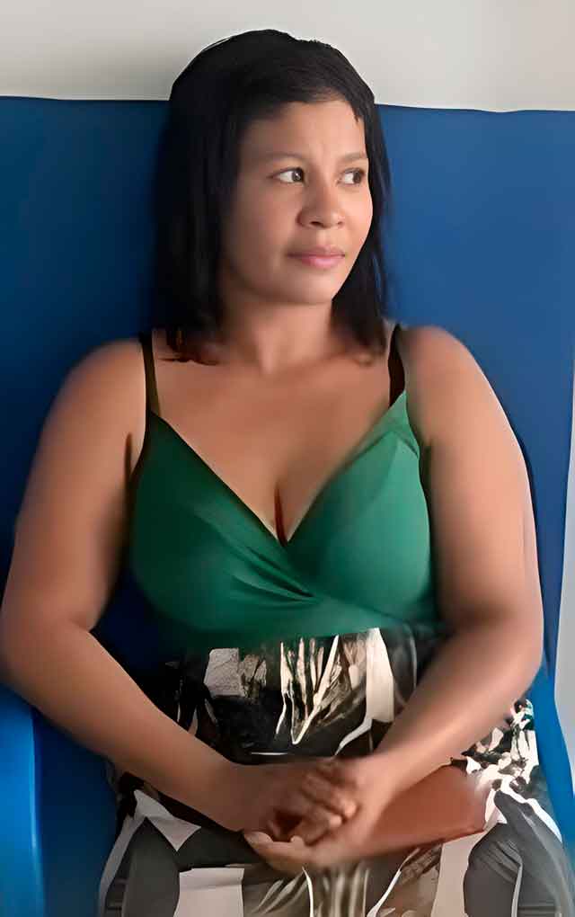 Aracelis Alc&aacute;ntara a sus dos hijos