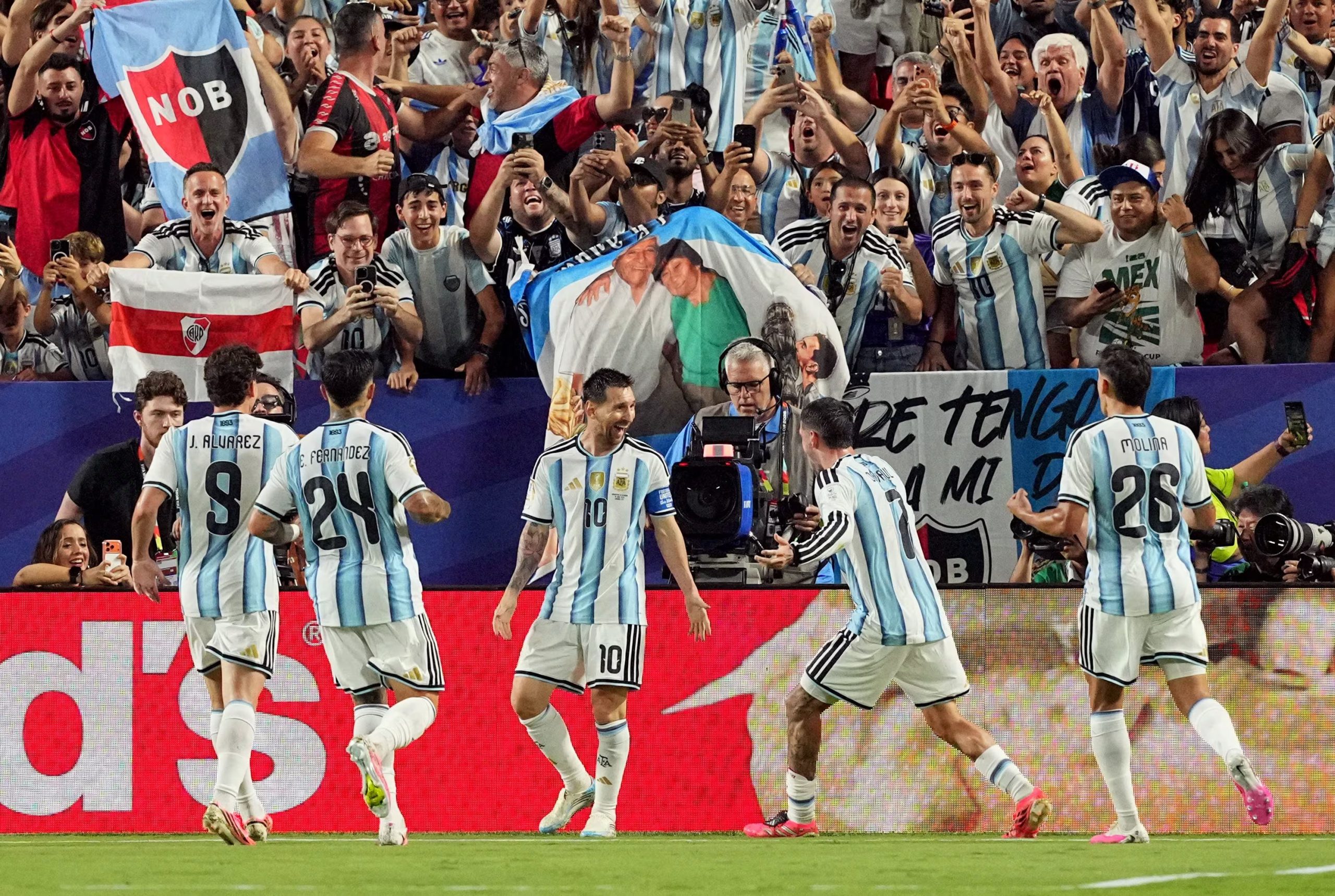 Soccer Football - FIFA World Cup 2026 - Group J - Argentina v Algeria - Kansas City Stadium, Kansas City, Missouri, U.S. - June 16, 2026 Argentina's Lionel Messi celebrates scoring their third goal with teammates to complete a hat-trick IMAGN IMAGES via Reuters/Denny Medley