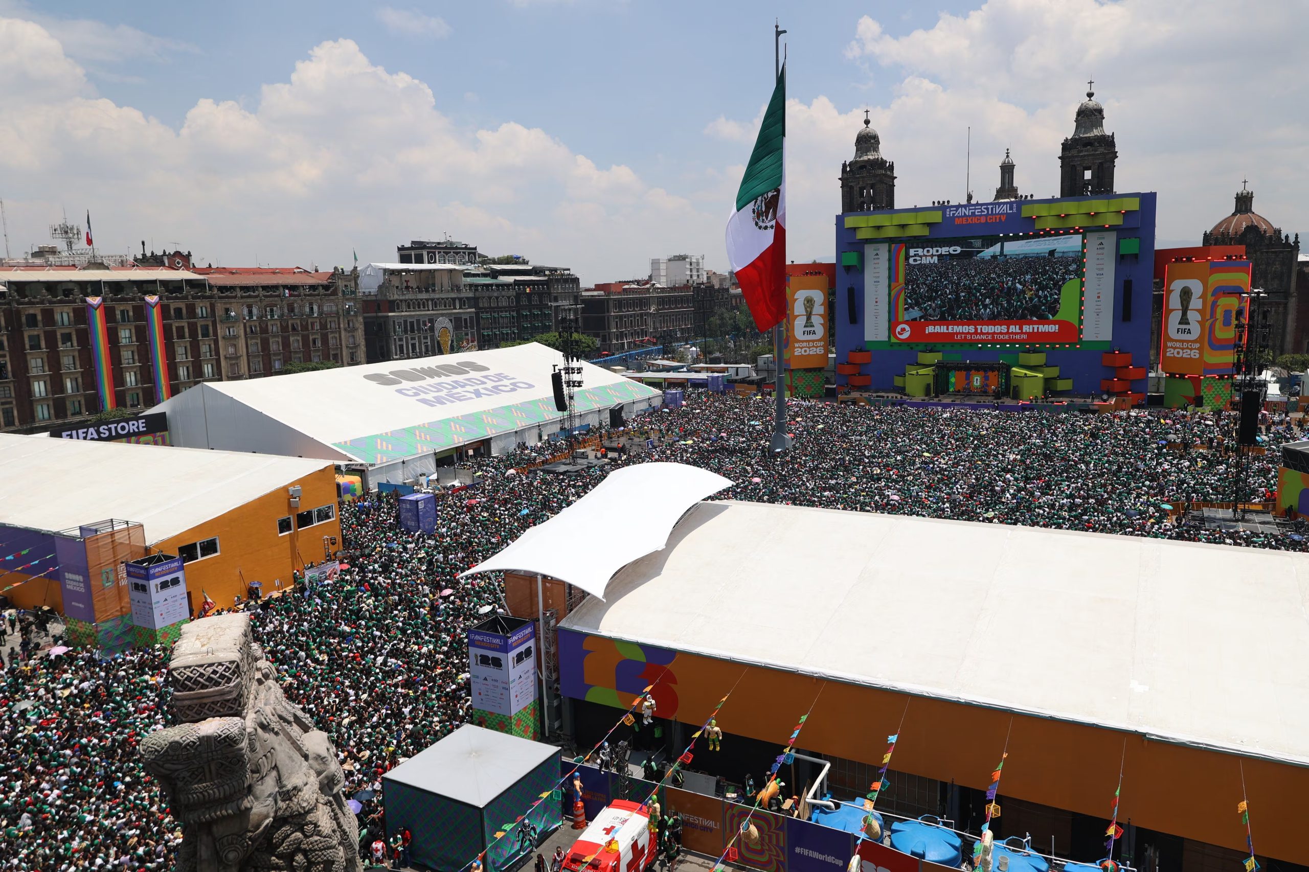 People gather at the FIFA Fan Festival at Zocalo square ahead of the 2026 World Cup football tournament Group A match between Mexico and South Africa in Mexico City on June 11, 2026. (Photo by LUIS CORTES / AFP)