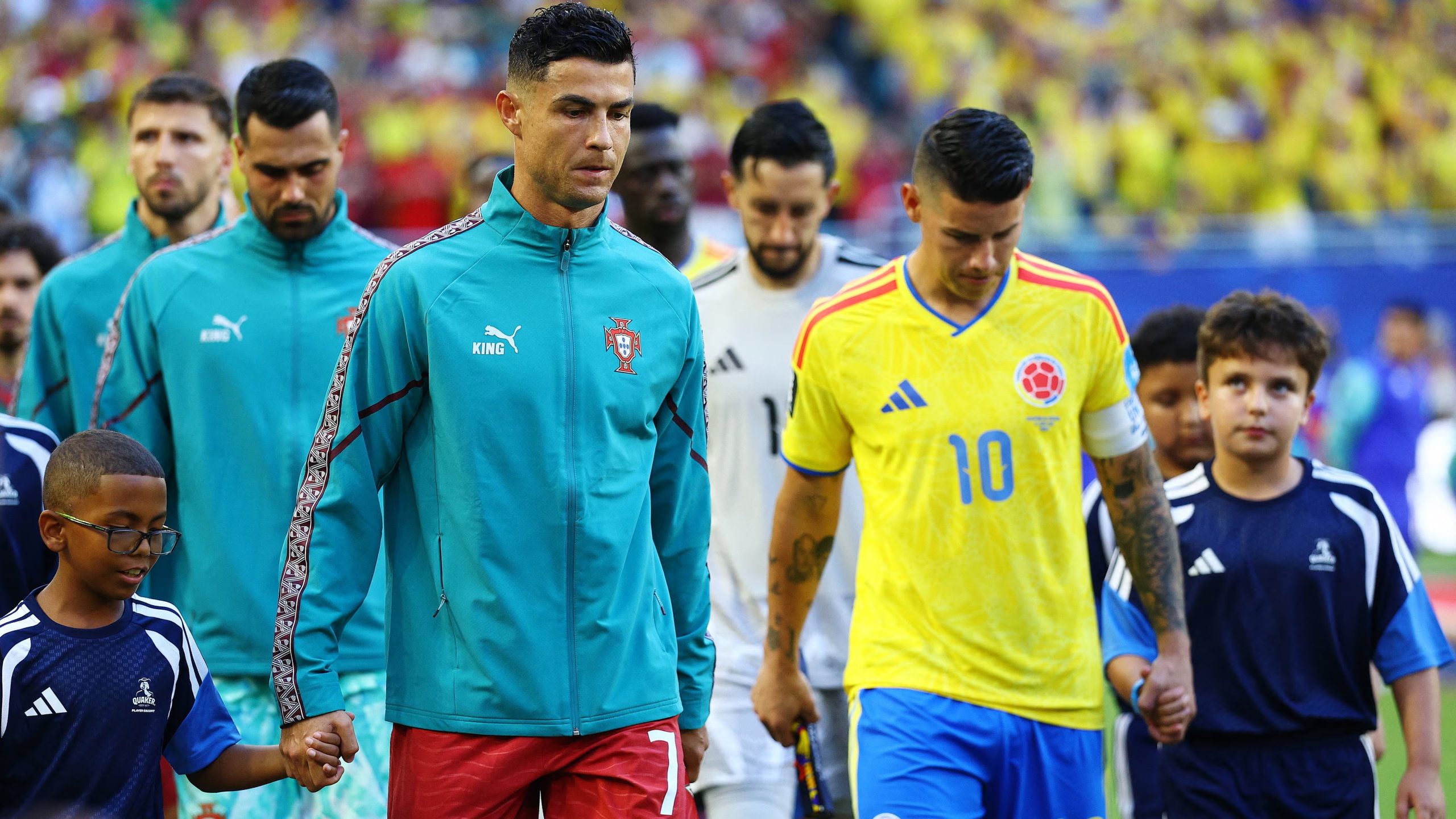 Soccer Football - FIFA World Cup 2026 - Group K - Colombia v Portugal - Miami Stadium, Miami Gardens, Florida, U.S. - June 27, 2026 Portugal's Cristiano Ronaldo and Colombia's James Rodriguez walk onto the pitch before the match IMAGN IMAGES via Reuters/Nathan Ray Seebeck