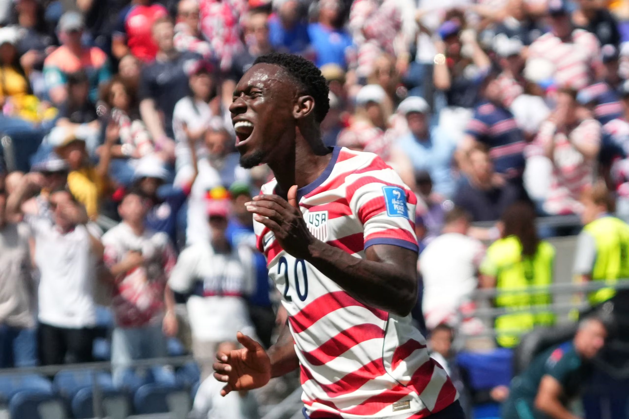 El delantero de Estados Unidos, Folarin Balogun, reacciona durante el partido ante Australia por el Grupo D del Mundial en Seattle, viernes 19 de junio, 2026. (AP Foto/Ted S. Warren)