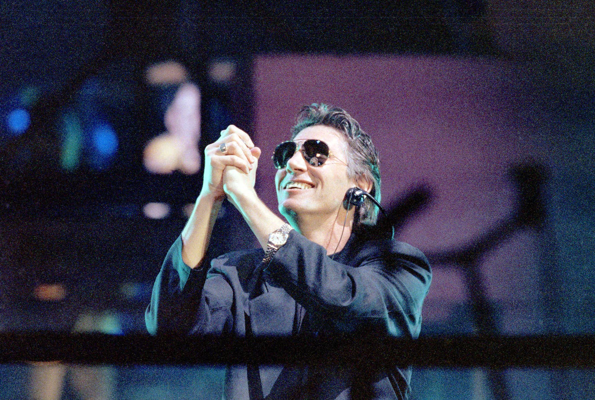 Roger Waters convirtió el episodio de Montreal de 1977 en el origen de The Wall, un disco sobre la alienación, el totalitarismo, la soledad y la guerra. En la foto en el concierto de Berlín del 21 de julio de 1990 (Grosby)